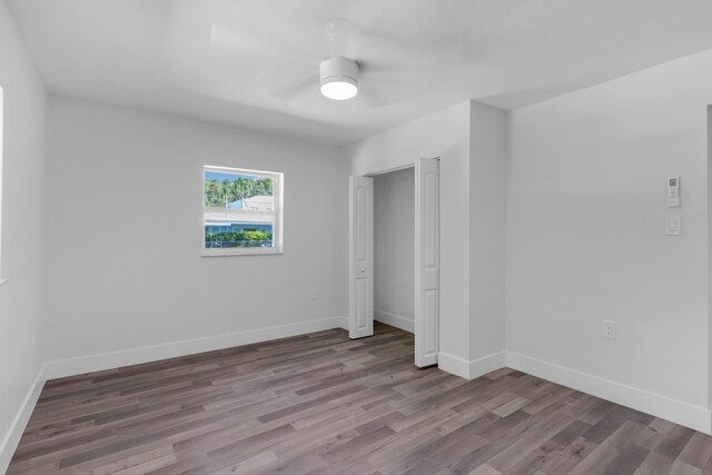 unfurnished room with light wood-type flooring