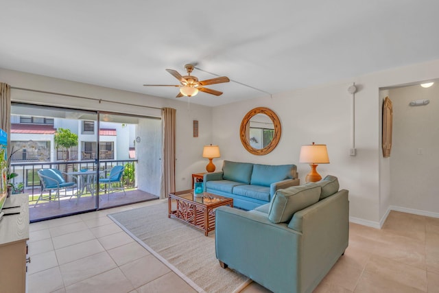 601 W Ocean Dr Unit 414D, Key Colony, FL 33051 - living area with ceiling fan, light tile patterned floors, and baseboards