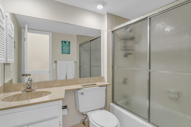 601 W Ocean Dr Unit 414D, Key Colony, FL 33051 - bathroom with vanity, toilet, and enclosed tub / shower combo