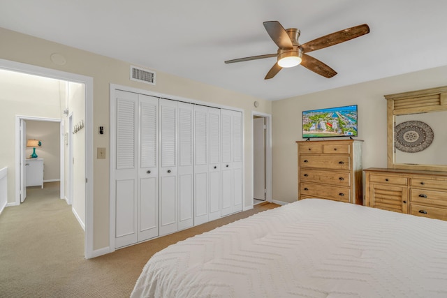 601 W Ocean Dr Unit 414D, Key Colony, FL 33051 - bedroom featuring light colored carpet, a closet, and baseboards