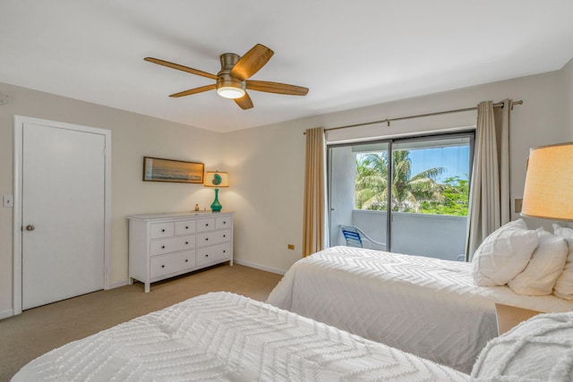 601 W Ocean Dr Unit 414D, Key Colony, FL 33051 - bedroom with access to exterior, carpet, baseboards, and a ceiling fan