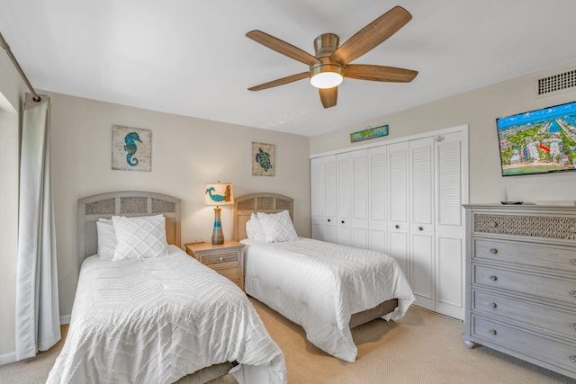 601 W Ocean Dr Unit 414D, Key Colony, FL 33051 - bedroom with light colored carpet, a closet, and ceiling fan