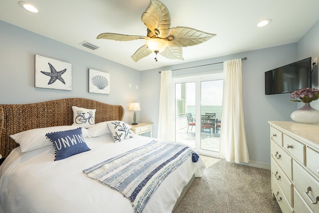 bedroom featuring light carpet, access to exterior, and ceiling fan