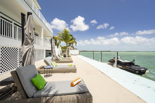 view of patio featuring a water view