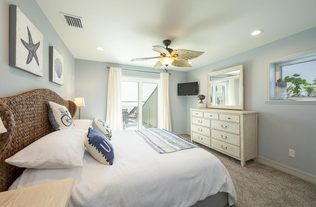 carpeted bedroom with access to exterior and ceiling fan