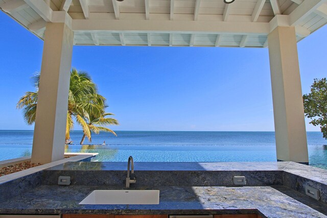 30 Ocean Front Dr, Key Largo, FL 33037 - view of patio with a water view and sink