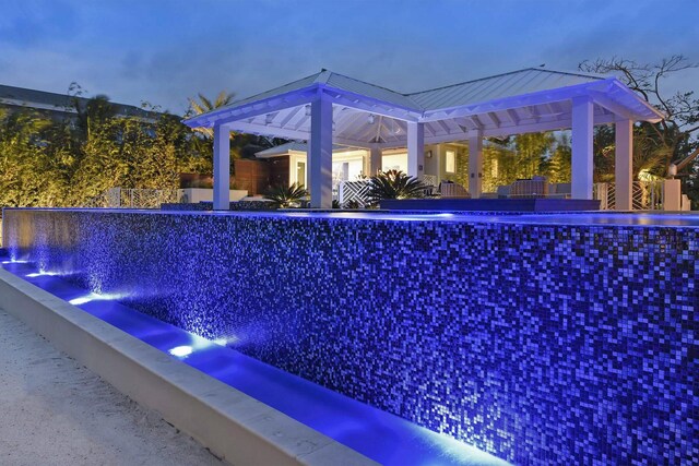 30 Ocean Front Dr, Key Largo, FL 33037 - pool at dusk featuring a gazebo