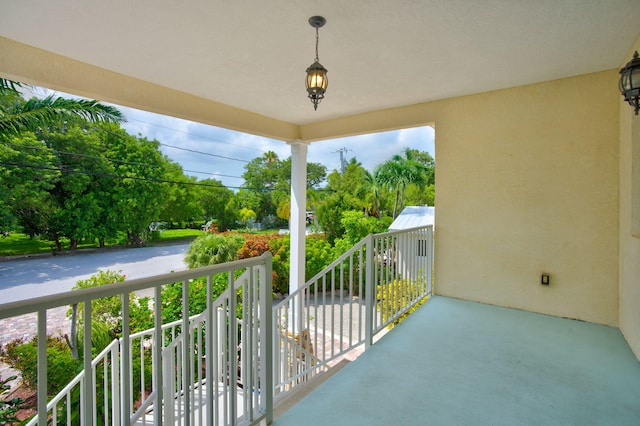 view of patio / terrace with a balcony