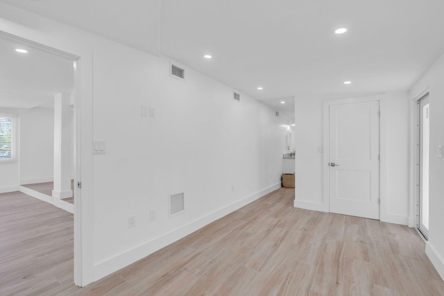 empty room with light wood-type flooring