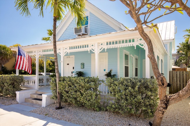 1030 James St, Key West, FL 33040 - view of front facade with covered porch and cooling unit
