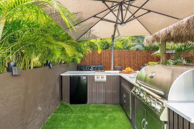 1030 James St, Key West, FL 33040 - view of patio with grilling area, area for grilling, and fence