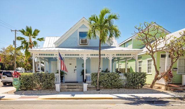 1030 James St, Key West, FL 33040 - view of front of home featuring covered porch and metal roof