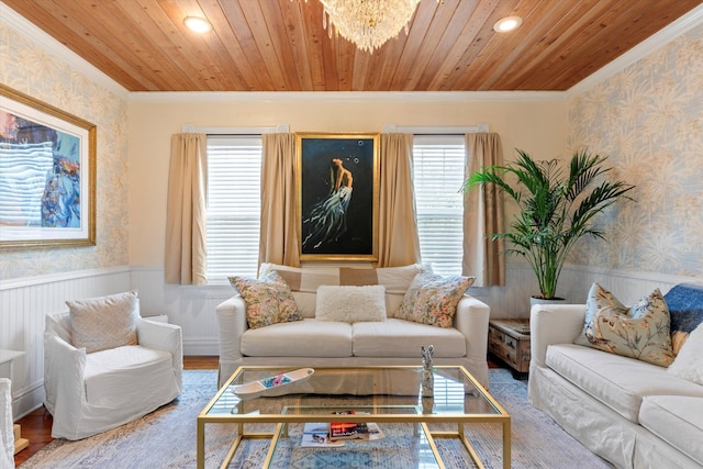 1030 James St, Key West, FL 33040 - living area with wallpapered walls, crown molding, wainscoting, wood finished floors, and a chandelier