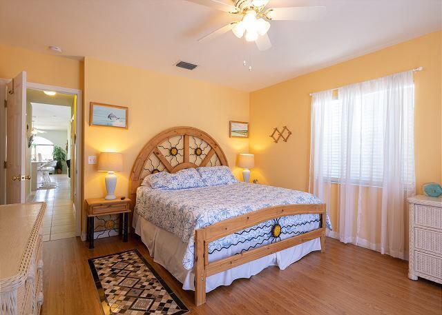 bedroom with ceiling fan and light wood-type flooring