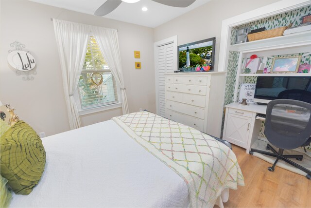 bedroom featuring ceiling fan and light wood-type flooring