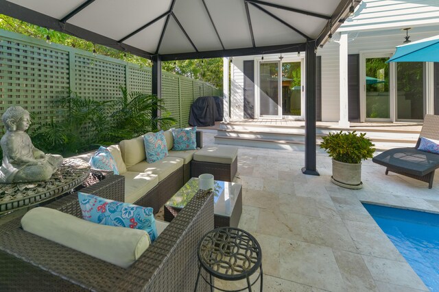 view of patio with a gazebo and an outdoor hangout area