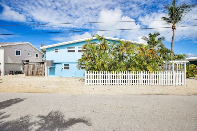 view of front of property with cooling unit