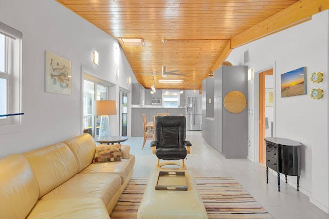 tiled living room with vaulted ceiling, ceiling fan, and wood ceiling