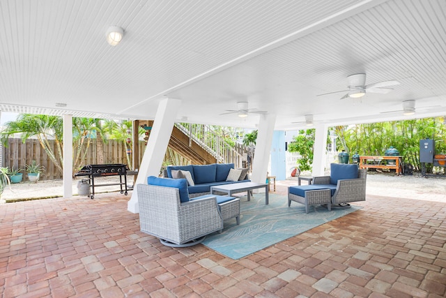 view of patio featuring outdoor lounge area and ceiling fan