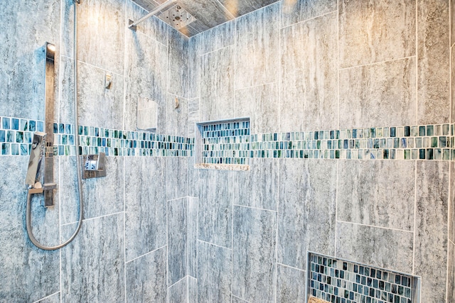 details with a tile shower