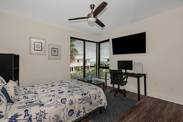 bedroom with ceiling fan and wood-type flooring