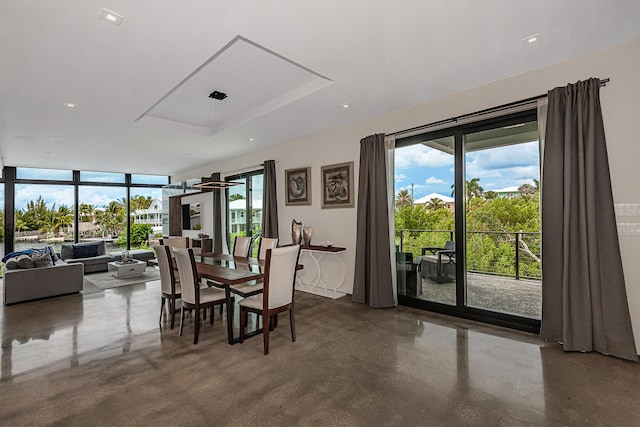 dining room featuring concrete flooring