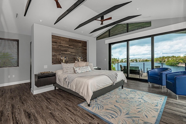 bedroom with a water view, lofted ceiling with beams, dark hardwood / wood-style flooring, ceiling fan, and access to exterior