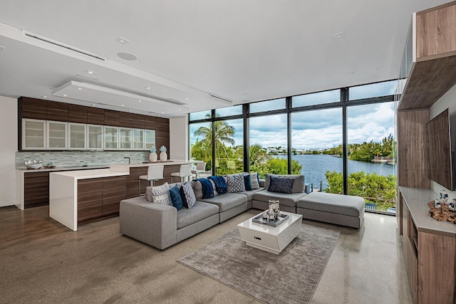 living room with floor to ceiling windows