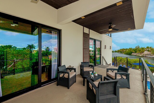 68 Mutiny Pl, Key Largo, FL 33037 - view of patio featuring a balcony, a water view, and ceiling fan