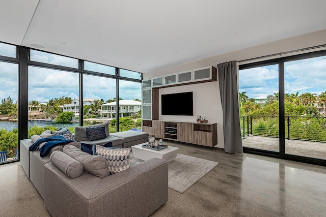 living room featuring a water view