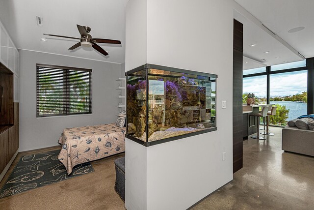 68 Mutiny Pl, Key Largo, FL 33037 - interior space featuring concrete flooring and ceiling fan