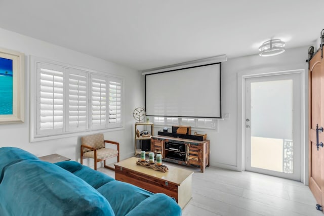 living room featuring a barn door