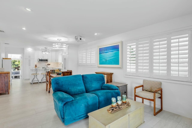 living room with light wood-type flooring