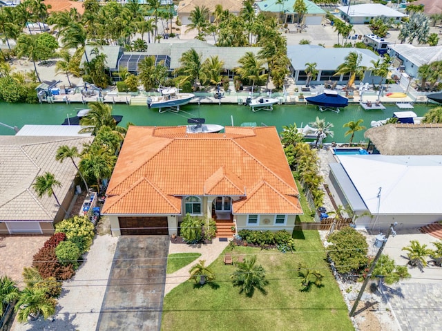 aerial view with a water view and a residential view