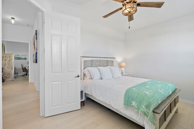 bedroom featuring ceiling fan and light wood-style floors