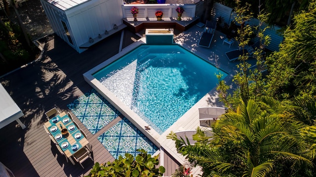 view of pool with a deck