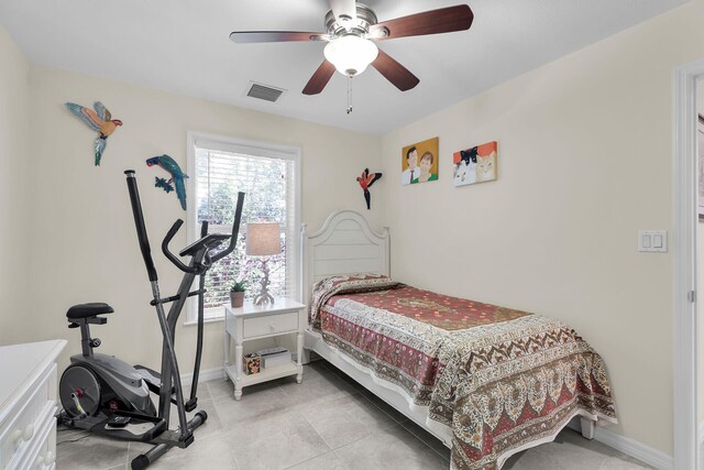 894 La Paloma Rd, Key Largo, FL 33037 - bedroom with baseboards and a ceiling fan