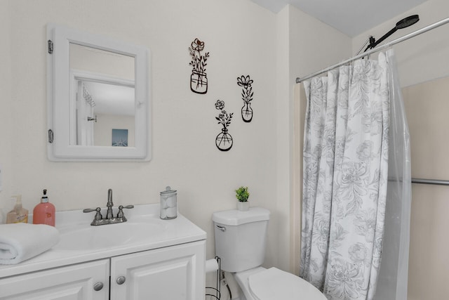 878 La Paloma Rd, Key Largo, FL 33037 - bathroom featuring vanity, toilet, and a shower with curtain