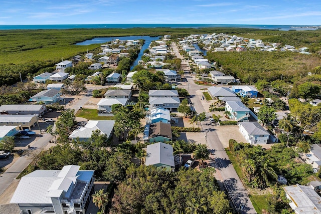 878 La Paloma Rd, Key Largo, FL 33037 - aerial view of property's location with a large body of water and nearby suburban area