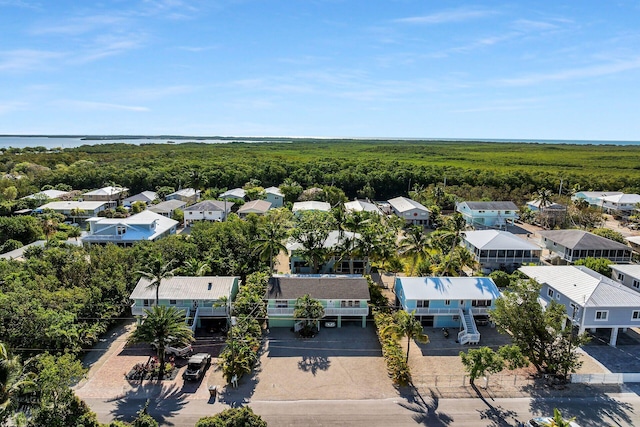 878 La Paloma Rd, Key Largo, FL 33037 - aerial perspective of suburban area featuring a heavily wooded area