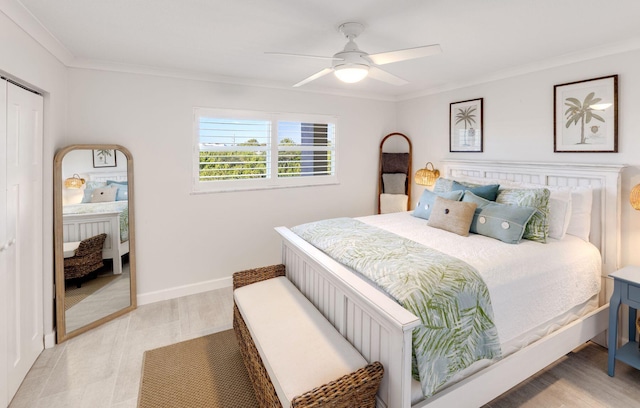 bedroom with ornamental molding and ceiling fan