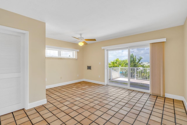 28573 Le Grand Rd, Little Torch, FL 33042 - empty room with ceiling fan and light tile patterned floors