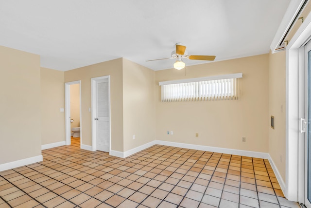 28573 Le Grand Rd, Little Torch, FL 33042 - spare room with a ceiling fan and light tile patterned floors