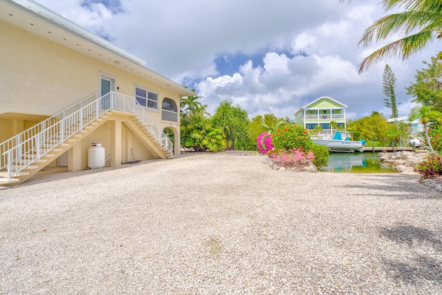 28573 Le Grand Rd, Little Torch, FL 33042 - exterior space featuring stairway and a water view