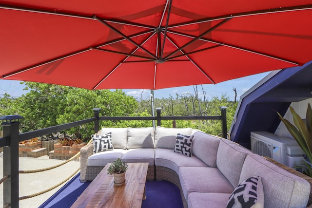 view of patio / terrace featuring a balcony and an outdoor living space