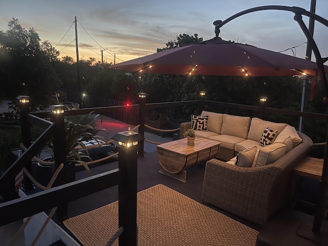 patio terrace at dusk with an outdoor hangout area