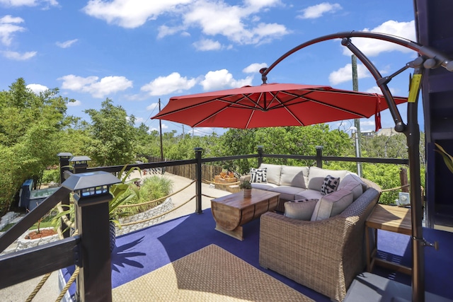 view of patio / terrace featuring a balcony and outdoor lounge area