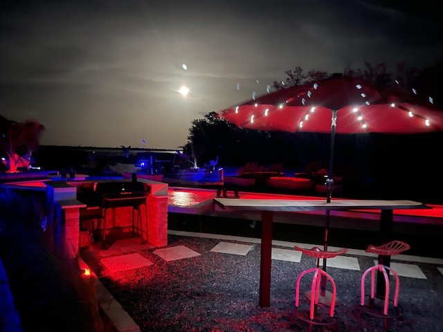 view of patio at night