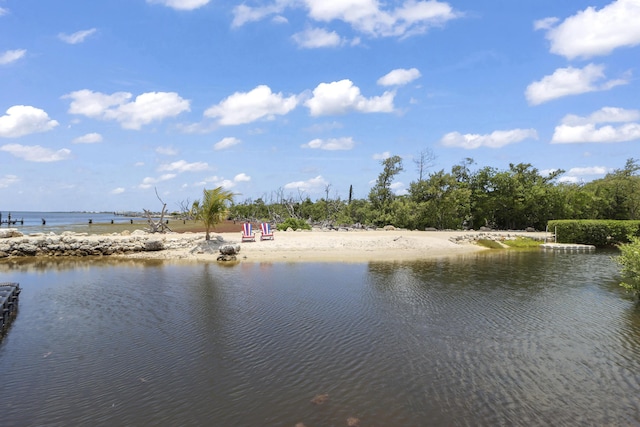 property view of water featuring a view of the beach