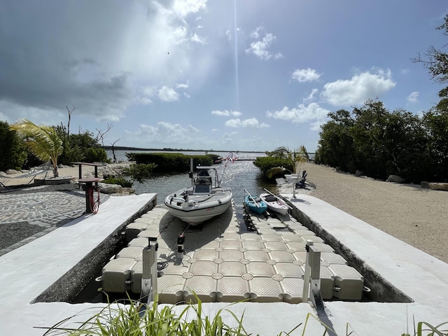 view of patio with a water view